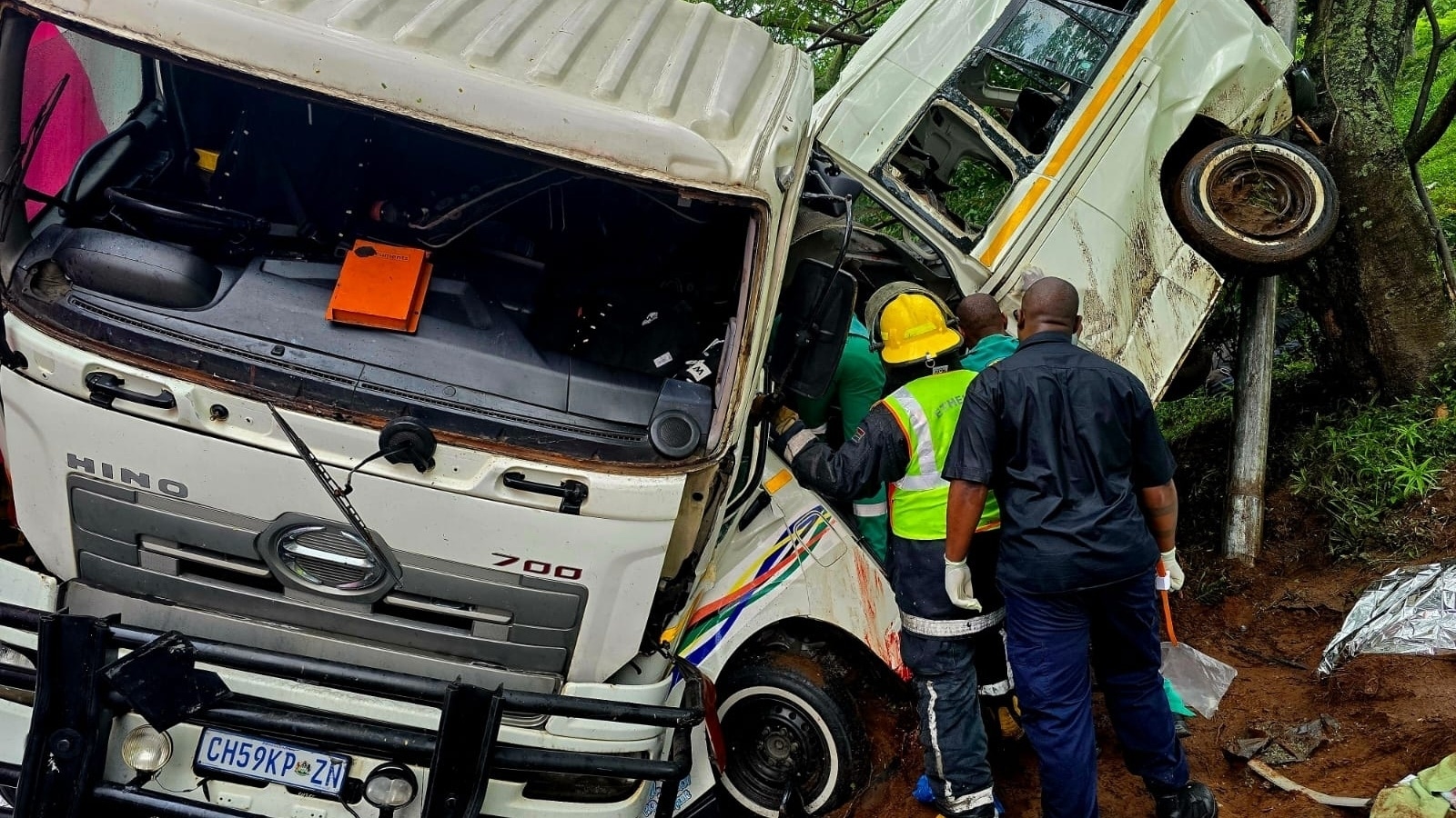 At least 11 dead in minibus and truck collision in South Africa days after a similar crash killed 14 children