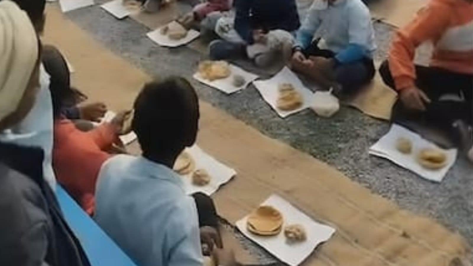 Republic Day shocker: MP school students served midday meal on torn notebook pages; principal to be suspended